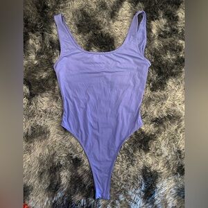 Purple spandex bodysuit
